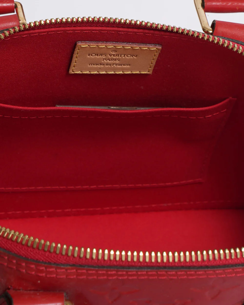 Louis Vuitton Alma BB leather handbag