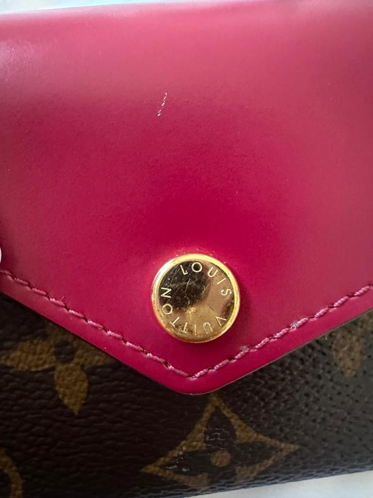 Louis Vuitton Zoé leather wallet