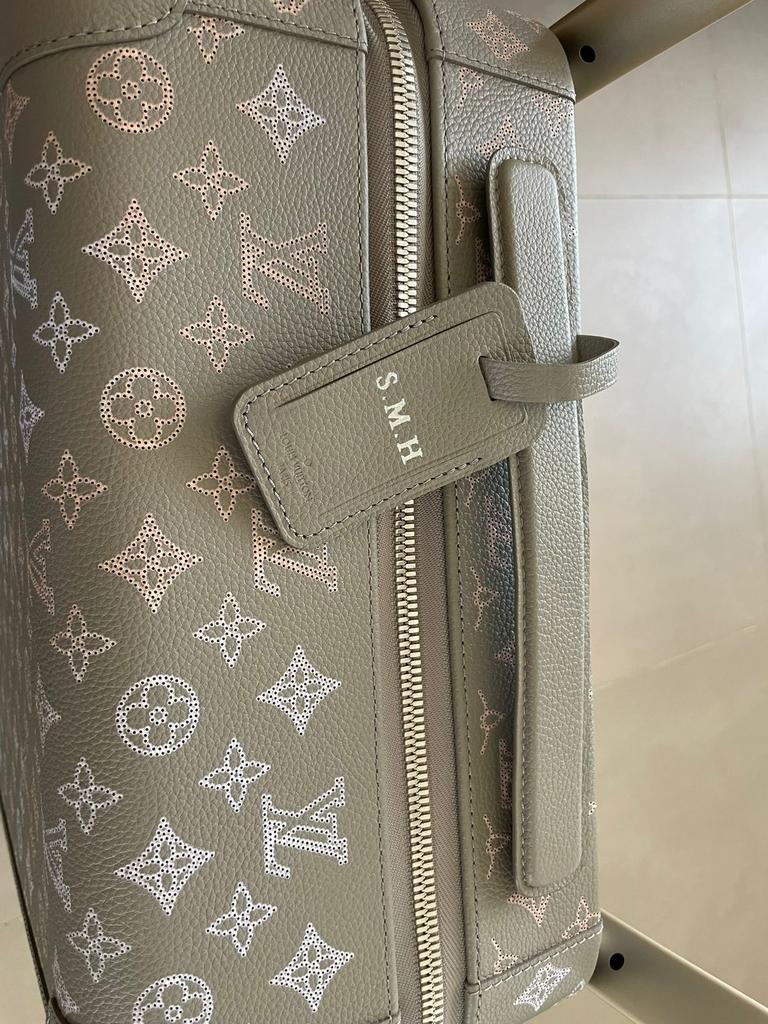 Louis Vuitton – Horizon 55 in Mahina perforated calfskin suitcase