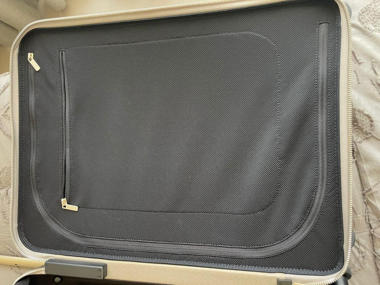 Louis Vuitton – Horizon 55 in Mahina perforated calfskin suitcase