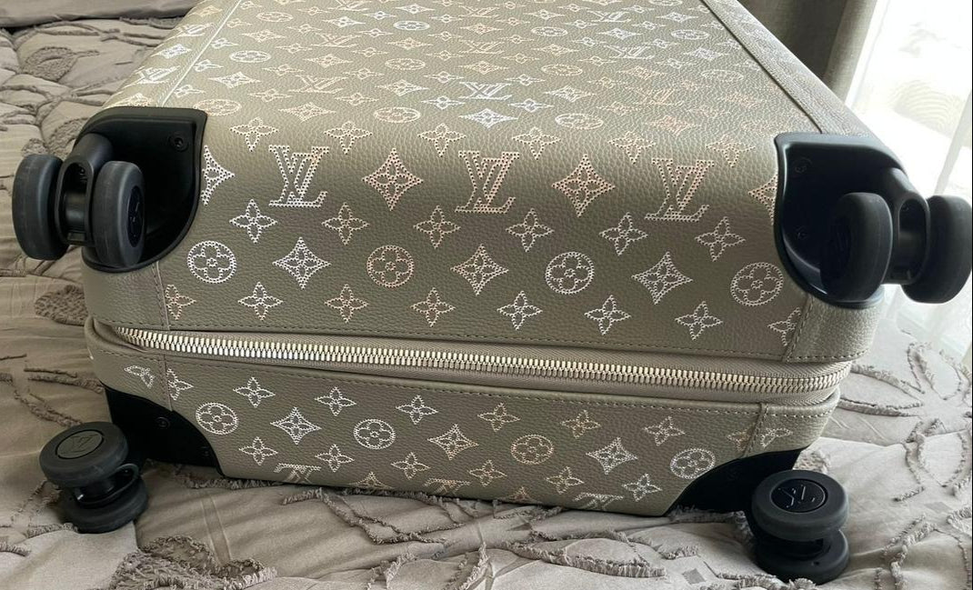 Louis Vuitton – Horizon 55 in Mahina perforated calfskin suitcase