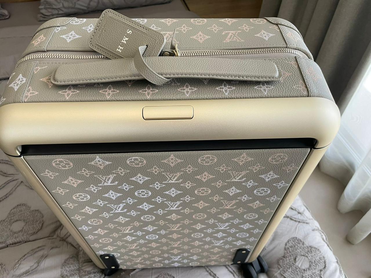 Louis Vuitton – Horizon 55 in Mahina perforated calfskin suitcase