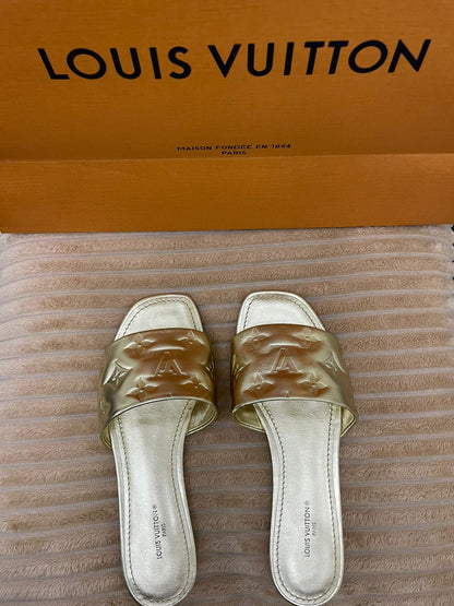 Louis Vuitton Gold Monogram Embossed Leather Revival Slides - Size 36