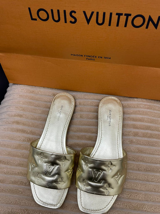 Louis Vuitton Gold Monogram Embossed Leather Revival Slides - Size 36