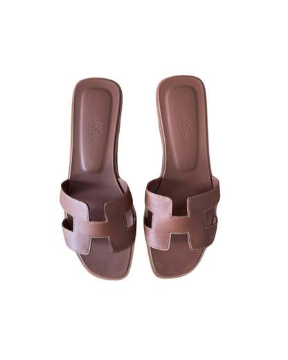 Hermès Oran Sandals Gold