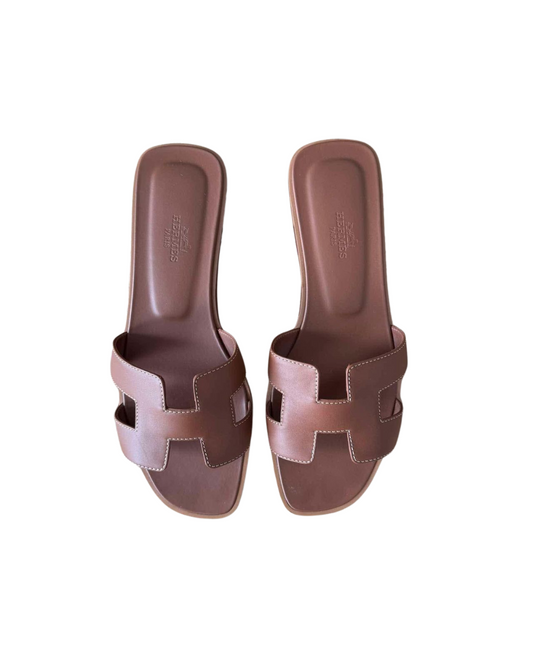 Hermès Oran Sandals Gold