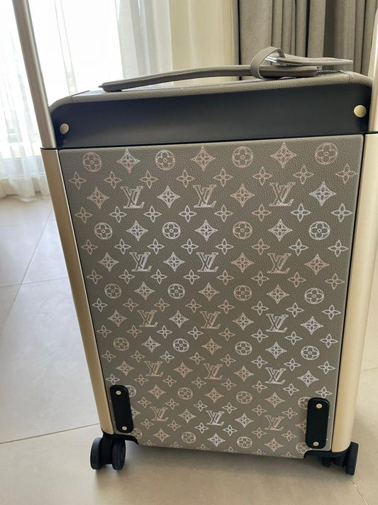 Louis Vuitton – Horizon 55 in Mahina perforated calfskin suitcase
