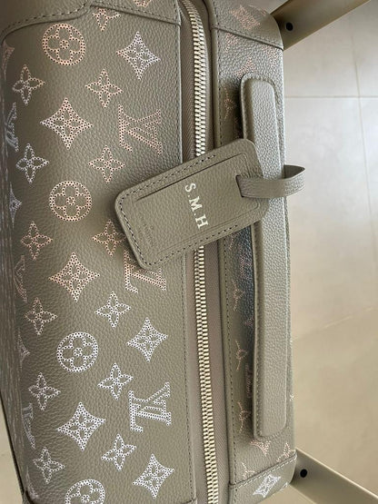 Louis Vuitton – Horizon 55 in Mahina perforated calfskin suitcase