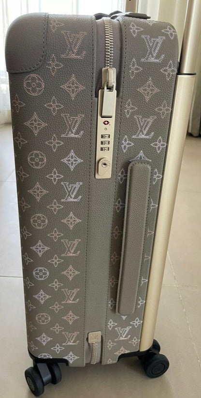 Louis Vuitton – Horizon 55 in Mahina perforated calfskin suitcase