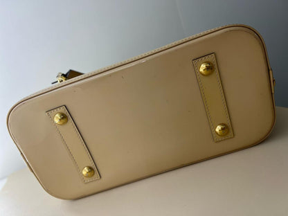 Louis Vuitton Alma PM Vernis Monogram bag beige