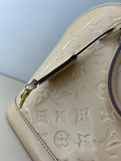 Louis Vuitton Alma PM Vernis Monogram bag beige